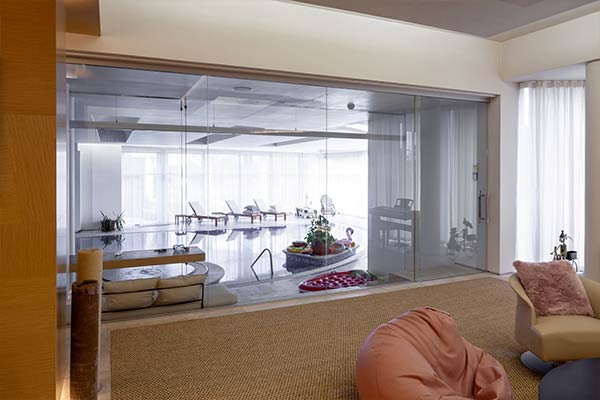 Transparent room divider: Sleek office interior design.